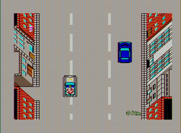 Captura de pantalla de Ghostbusters. Vemos una vista cenital de una calle con tres carriles. En ella hay dos coches.